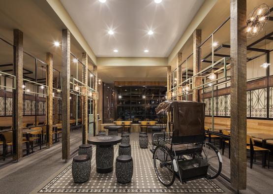 a room with a wheel chair and tables