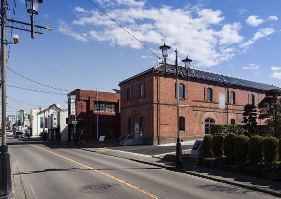 a street with a brick building