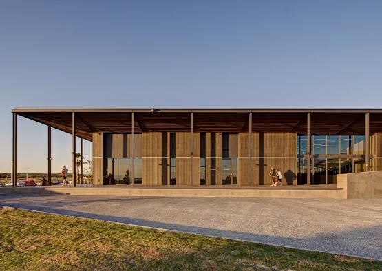 a building with a roof and a walkway