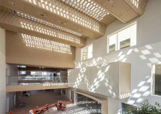 a building with a large ceiling and a machine