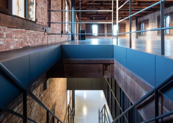 a brick building with a staircase