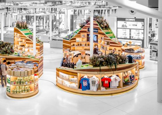 a store with shelves and shelves with clothing and flowers