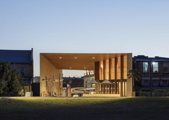 a building with a roof and a large open area