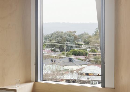 a window with a book and a book on it