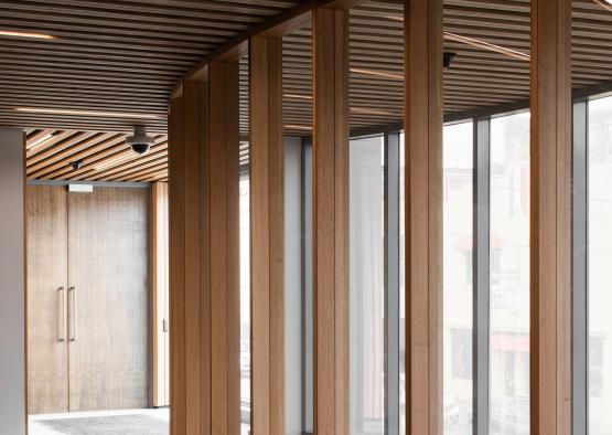 a room with wood and glass walls