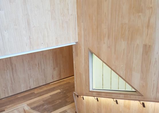 a wooden staircase with a window