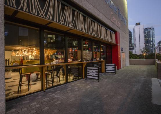 a building with a bar and tables