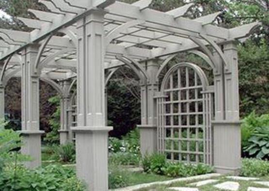 a pergola in a garden