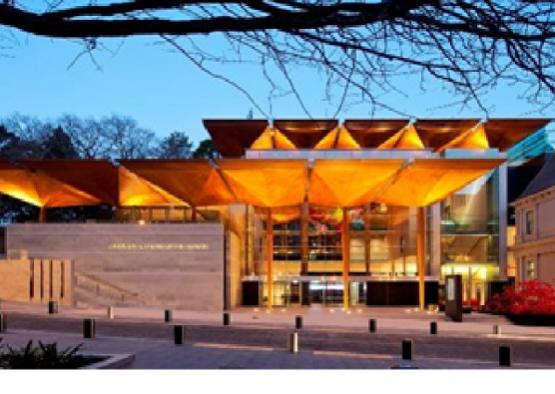 a building with a triangular roof