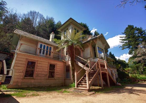 a house with a tree in the front