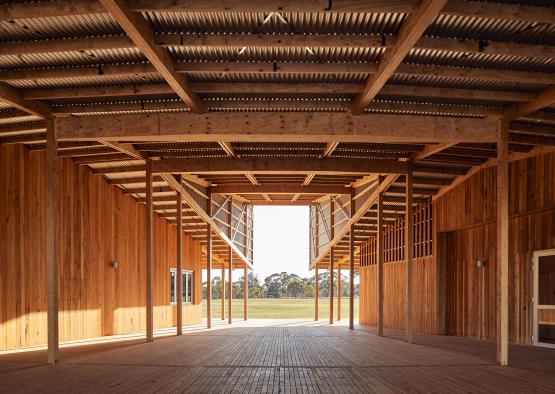 a wooden building with a wood floor and a wood floor