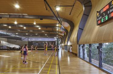 a group of people in a gym