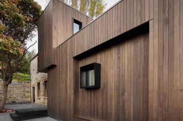 a wood building with a window