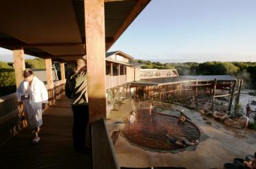 a group of people in a hot spring